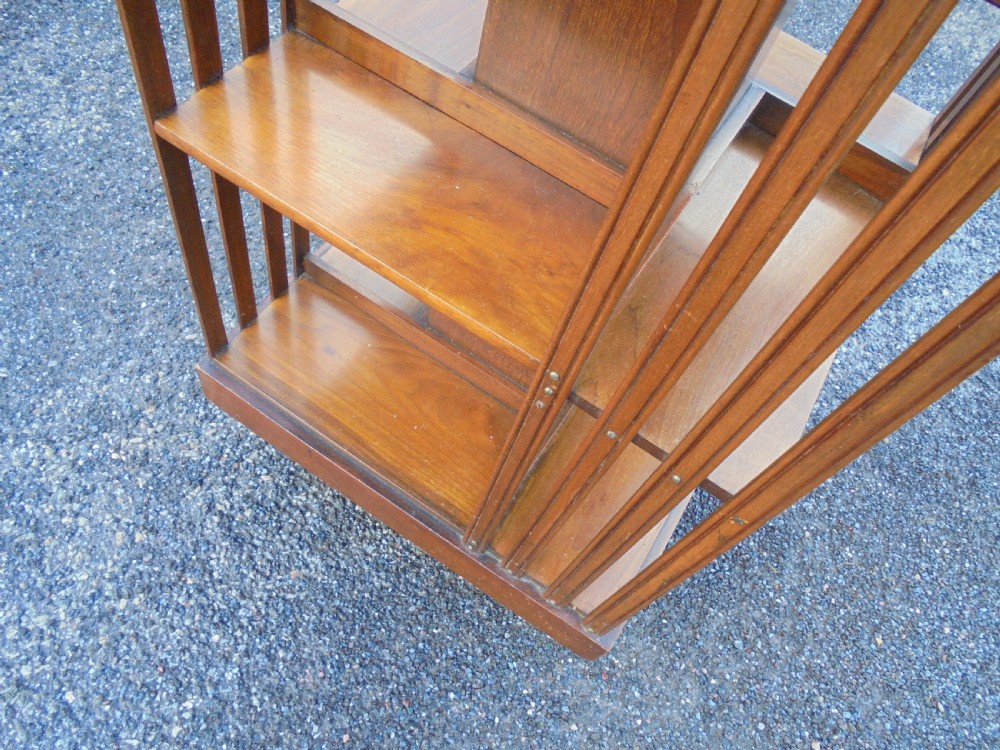 Walnut two tier revolving bookcase View V