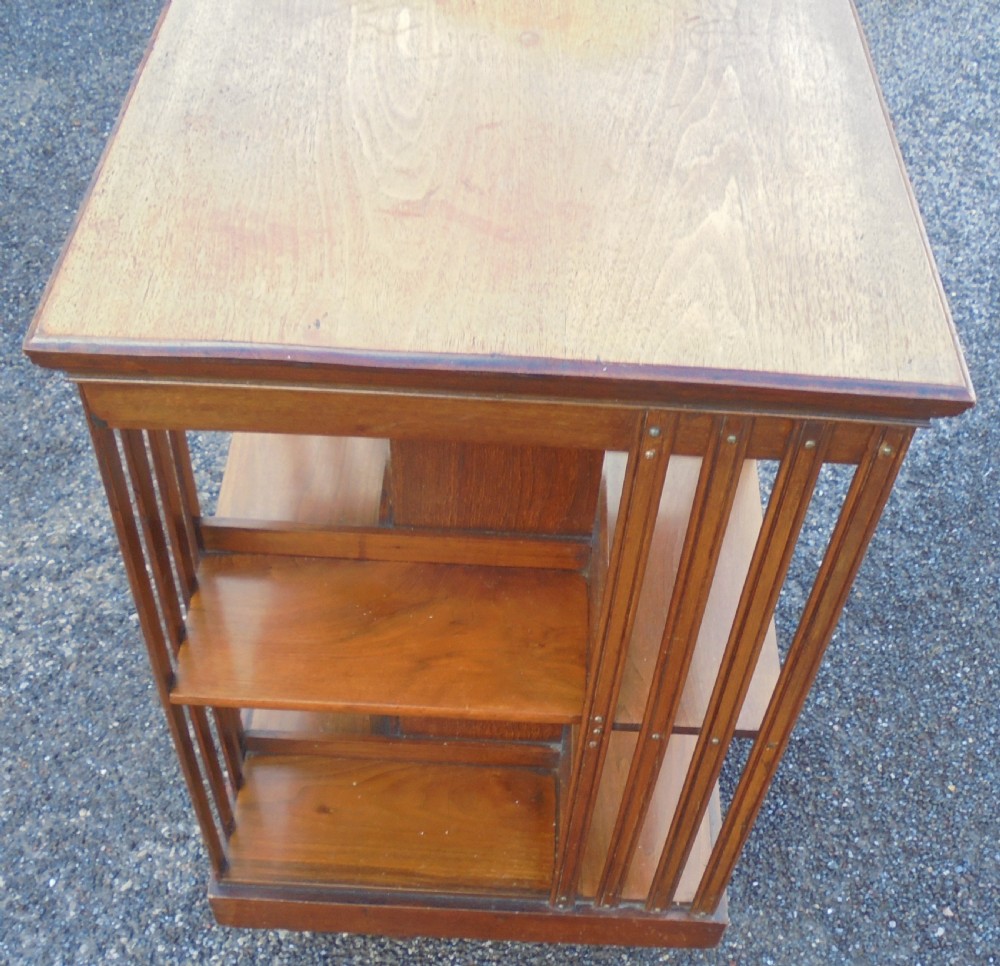 Walnut two tier revolving bookcase View VI