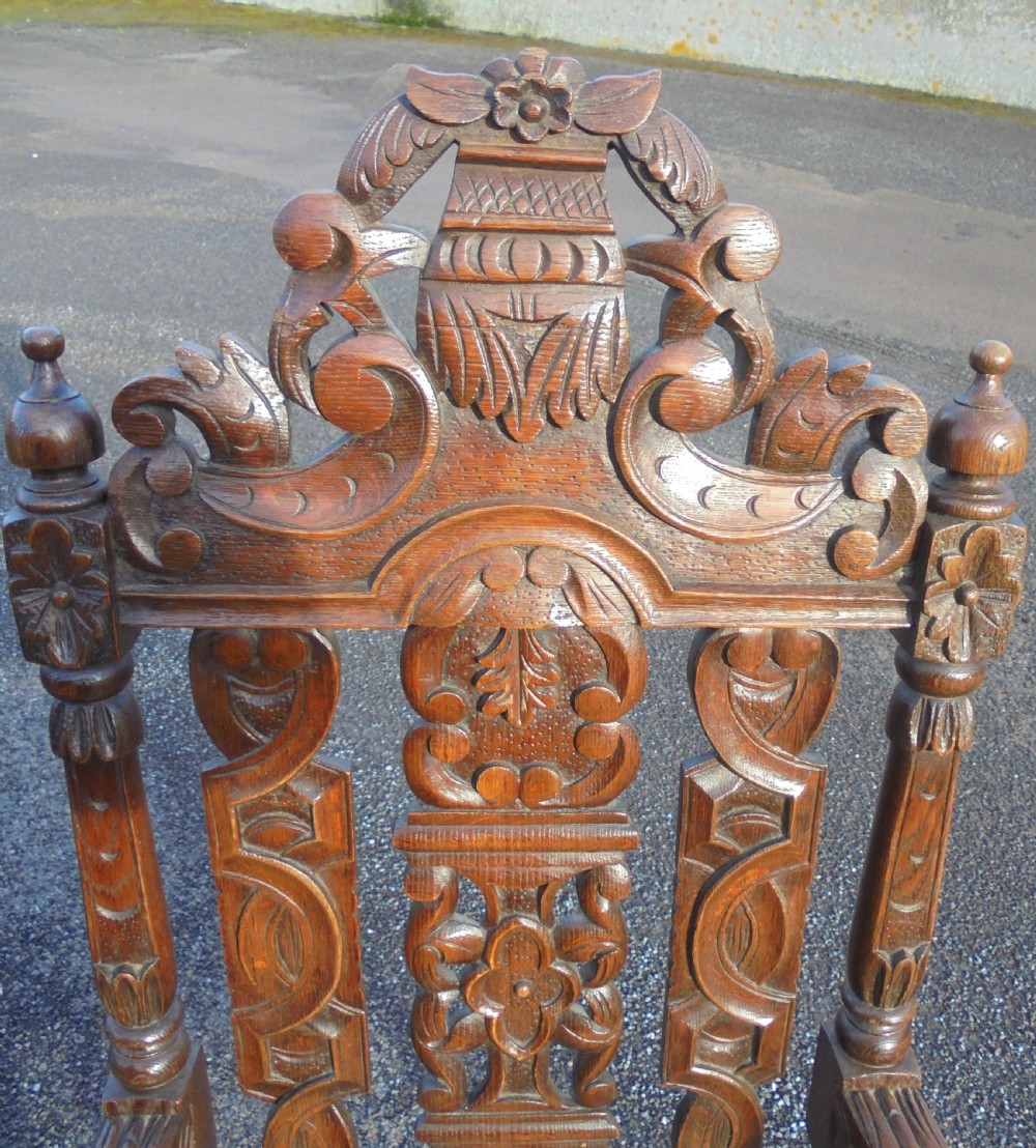Pair oak heavily carved large armchairs View III