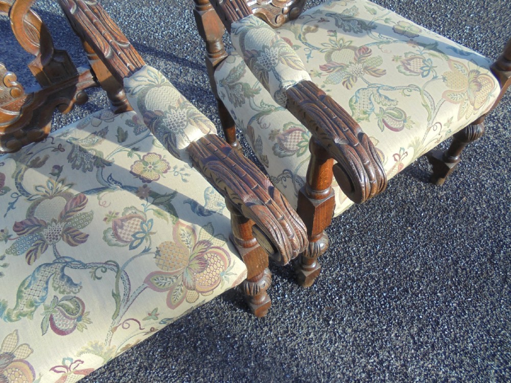 Pair oak heavily carved large armchairs View V