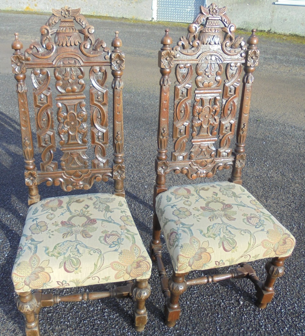 Pair Victorian high back carved oak hall chairs