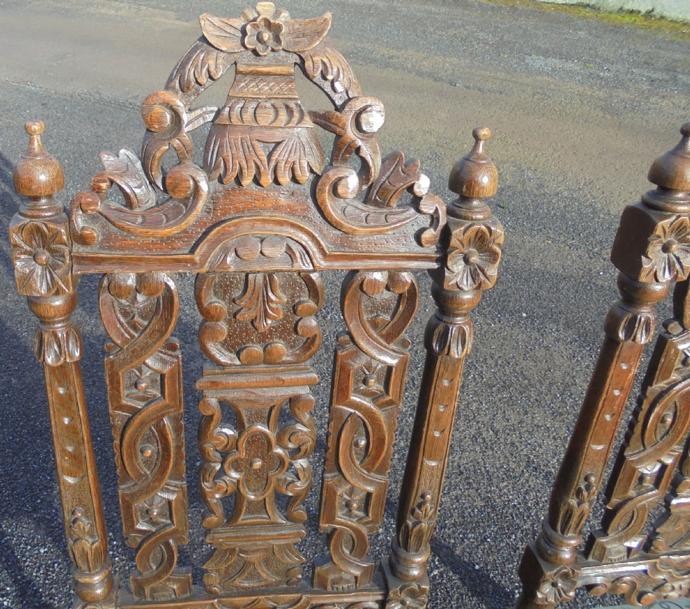 Pair Victorian high back carved oak hall chairs View IV
