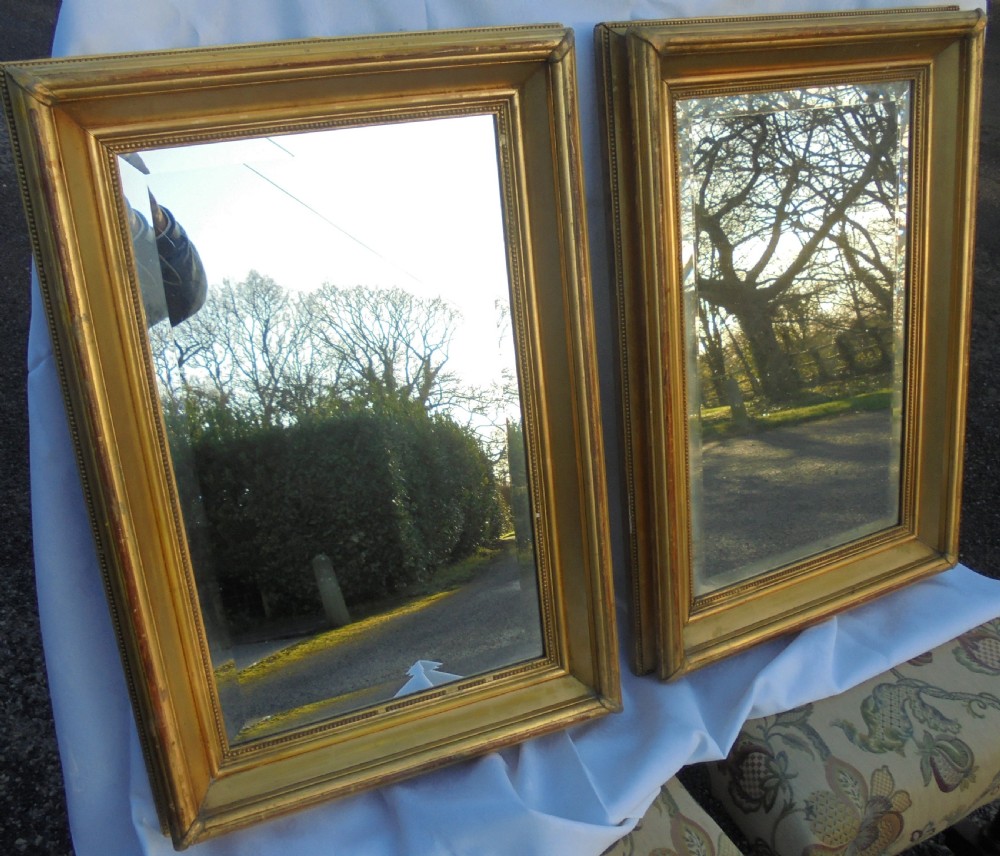 Pair Victorian gilded wall mirrors