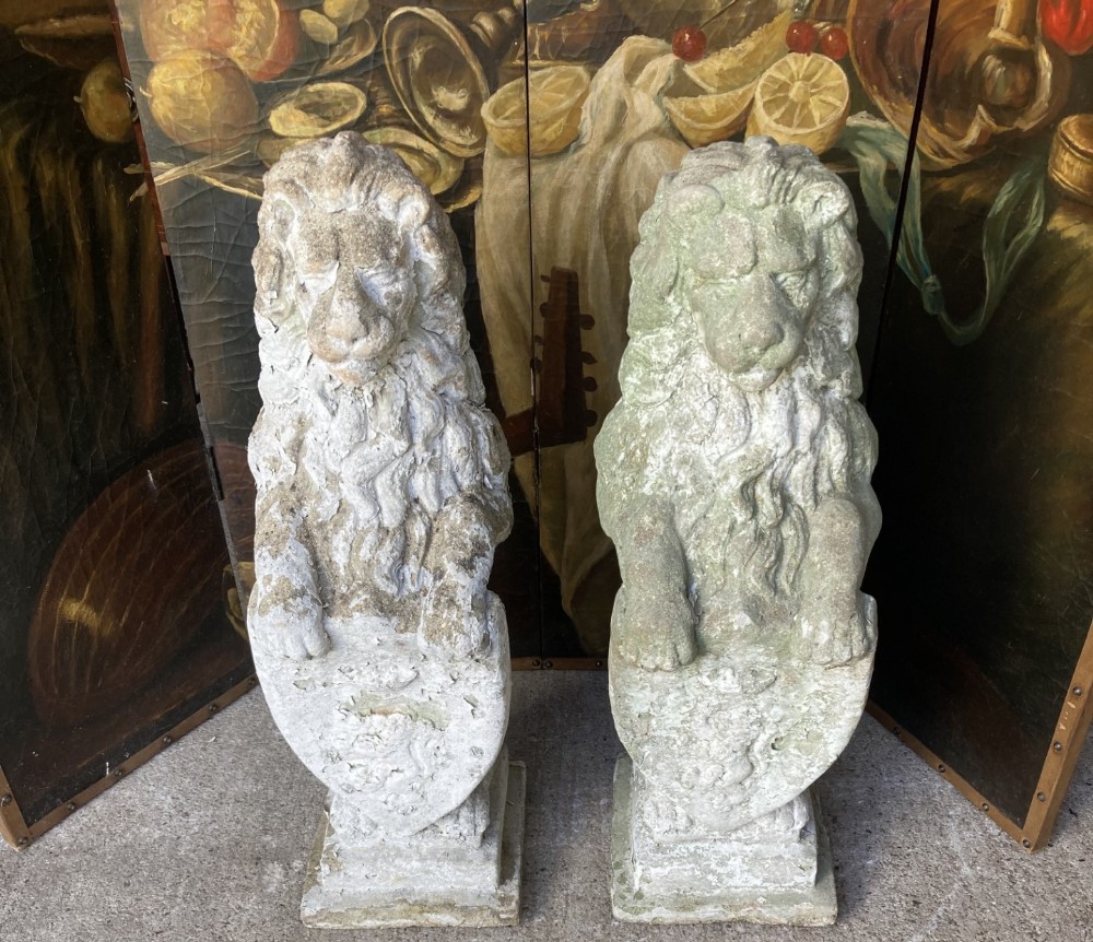 Pair well weathered stone Lions