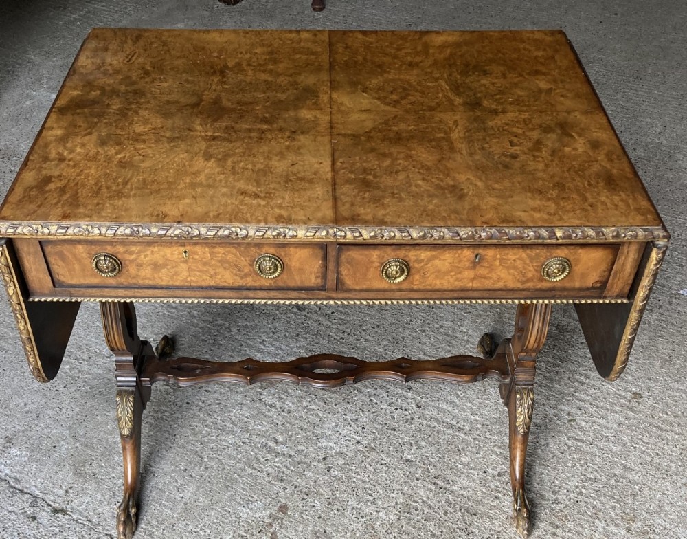 19th Century  walnut sofa table with gilding highlights