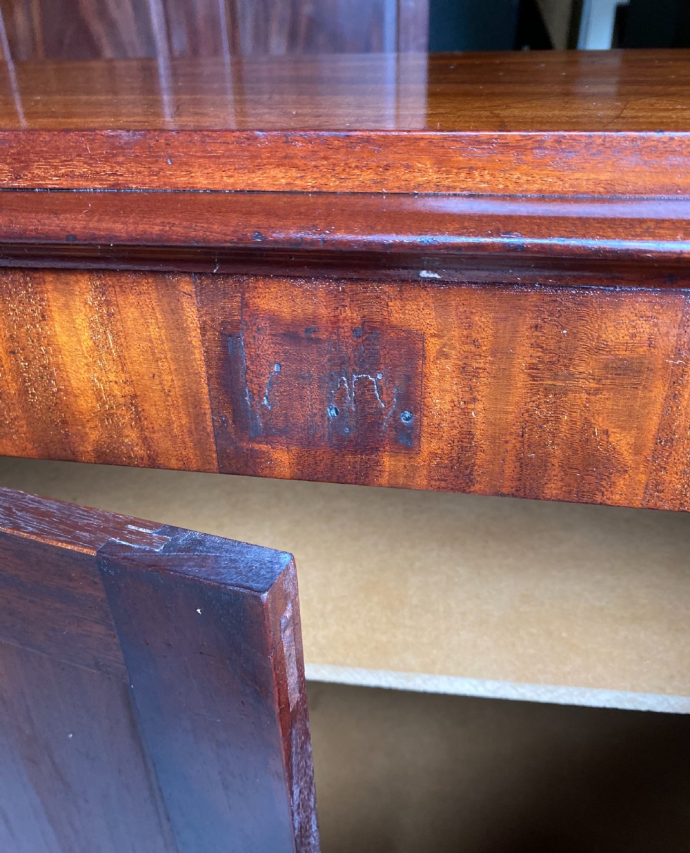 A nineteenth-century mahogany linen press cupboard featuring two panelled doors, recessed side panels, and a moulded top cornice. View VIII