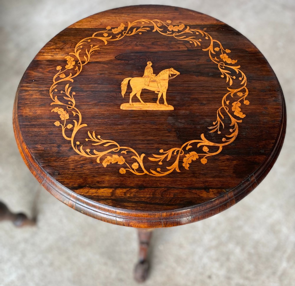 A Victorian dark rosewood trumpet work table featuring satinwood floral marquetry and an equestrian motif on top, raised on a tripod pedestal base. View III