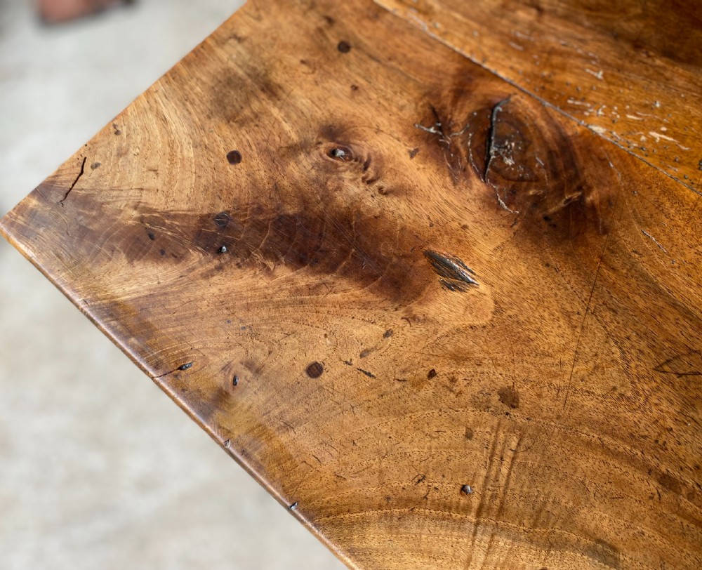 An 18th-century French fruitwood occasional table featuring a rectangular top, single drawer with an iron ring handle, turned legs, and a low stretcher base. View VII