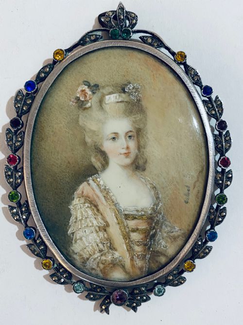 Miniature Portrait of a Lady in a Gem Set and Marcasite  Oval Frame