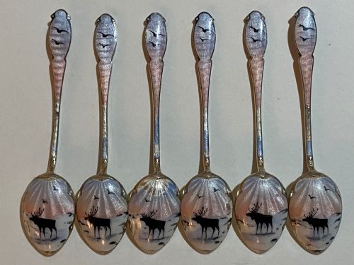 Cased Set of Norwegian Silver and Enamel Coffee Spoons, decorated with Reindeer. 