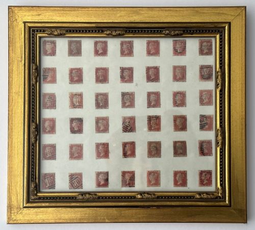 Framed Set of Forty-two Penny Red Stamps