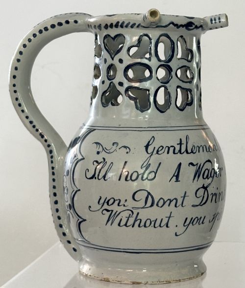 18th Century English Delftware Puzzle Jug.