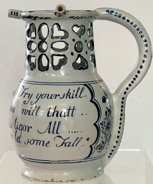 fig 1. 18th Century English Delftware Puzzle Jug.