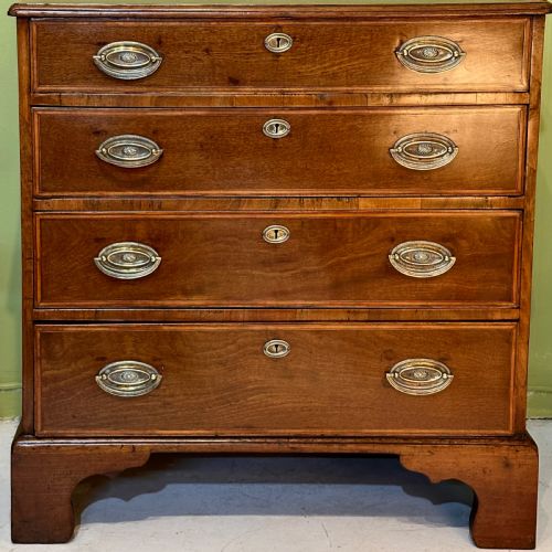 George III Walnut Chest of Drawers.