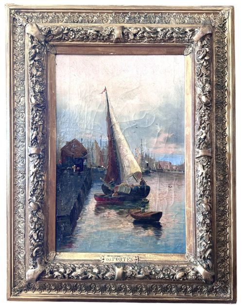 fig 1. A pair of framed oil paintings on canvas depicting wooden sailing boats docked in a harbour within ornate gold leaf frames.