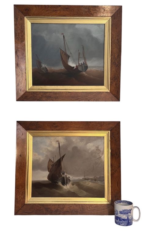 A pair of Victorian marine oil paintings depicting sailing boats navigating choppy seas, encased in wide burr wood frames with gilded slips. View X