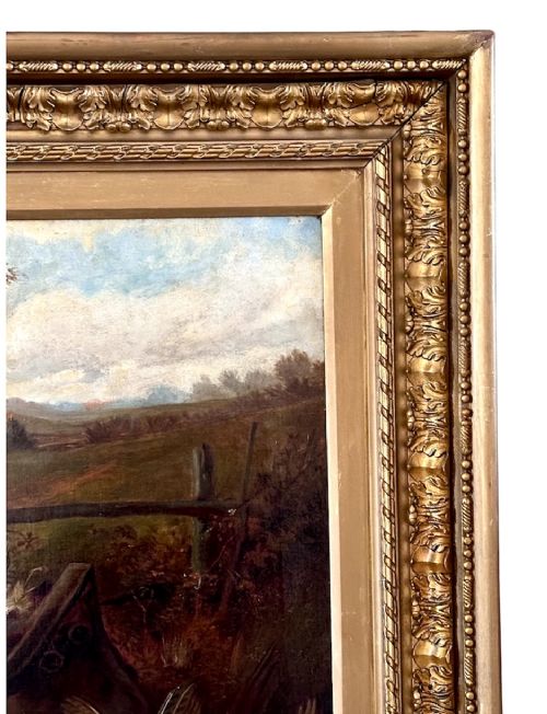 An oil painting on canvas depicting gun dogs lying beside harvested game birds in a rural landscape, framed in an ornate gold leaf frame. View VIII