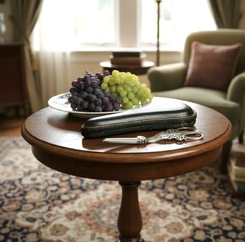 A pair of ornate silver grape scissors featuring pierced scrollwork handles, displayed inside an open blue velvet-lined fitted case. View XIII