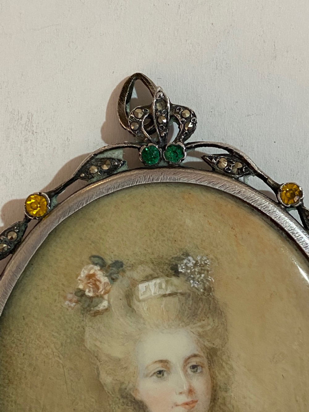 Miniature Portrait of a Lady in a Gem Set and Marcasite  Oval Frame View IV