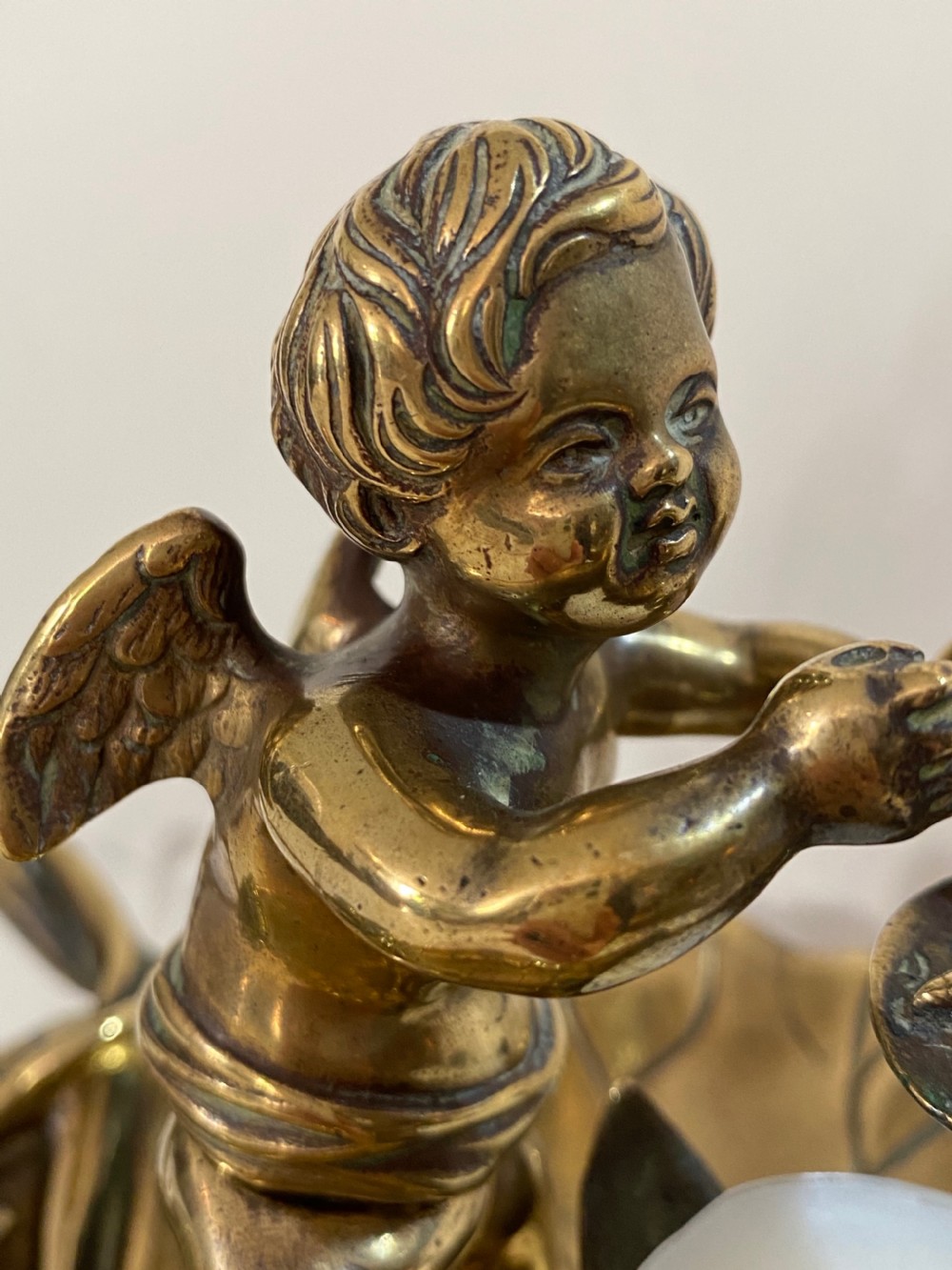 Brass Chamber Stick in the Form of a Cherub. 19th Century View II