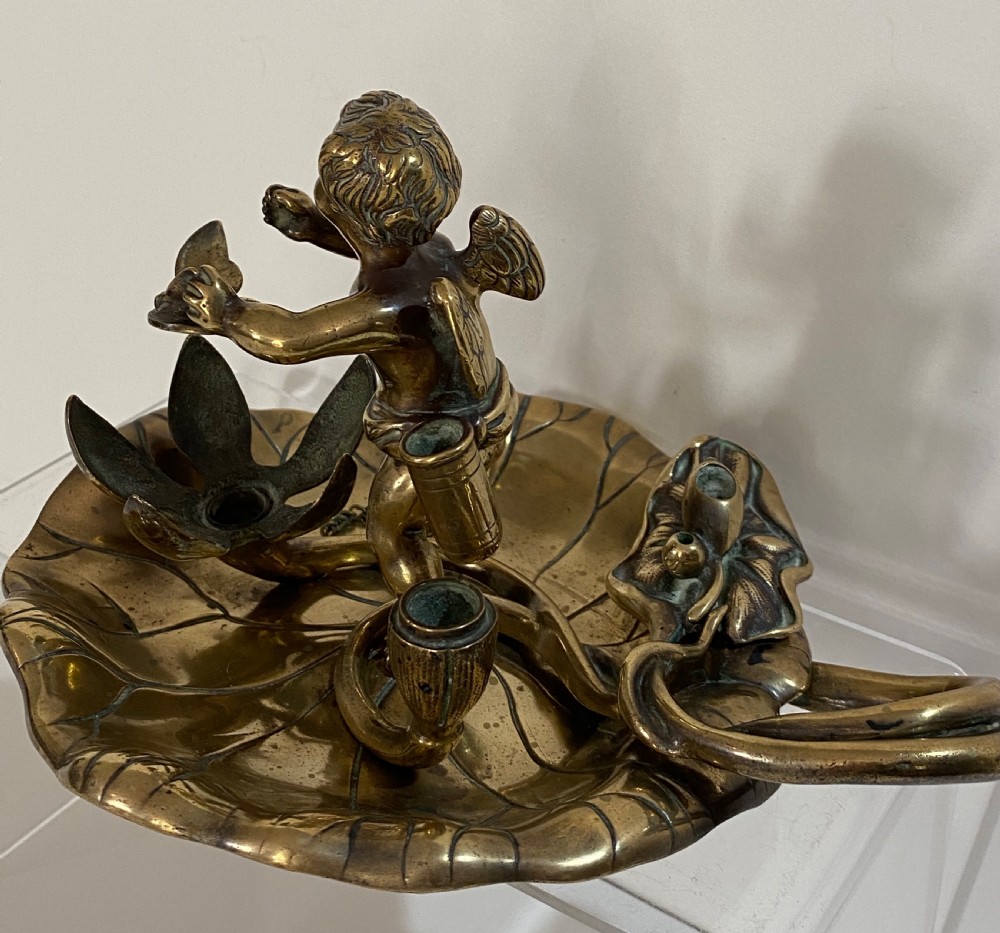 Brass Chamber Stick in the Form of a Cherub. 19th Century View IV