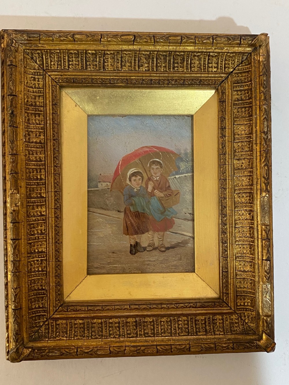 Oil on Board of Children in the Rain. Late Victorian