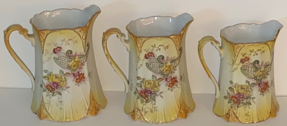 Three Graduated Antique Jugs.  View IV