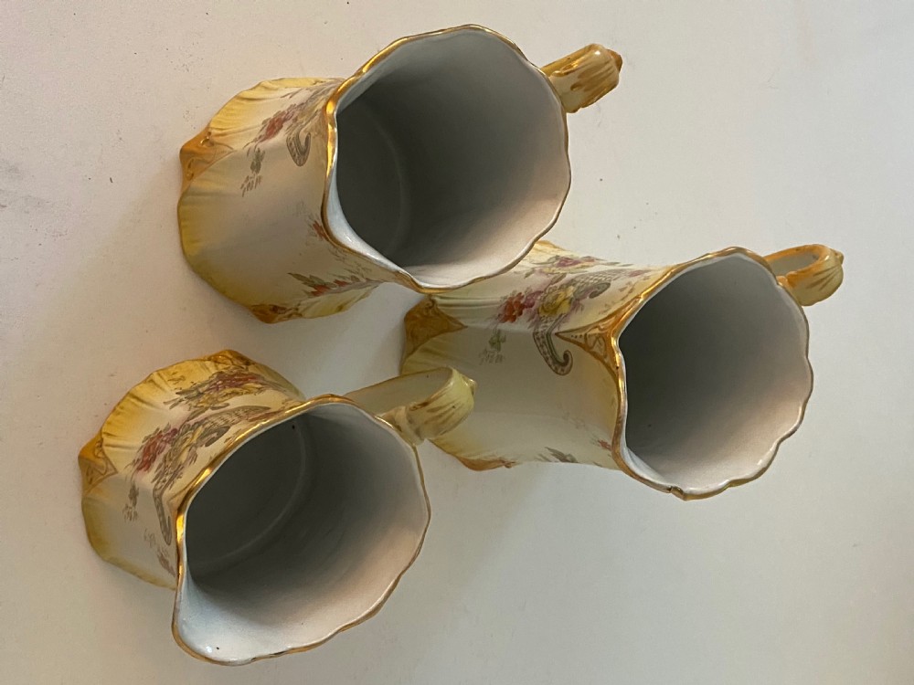 Three Graduated Antique Jugs.  View V