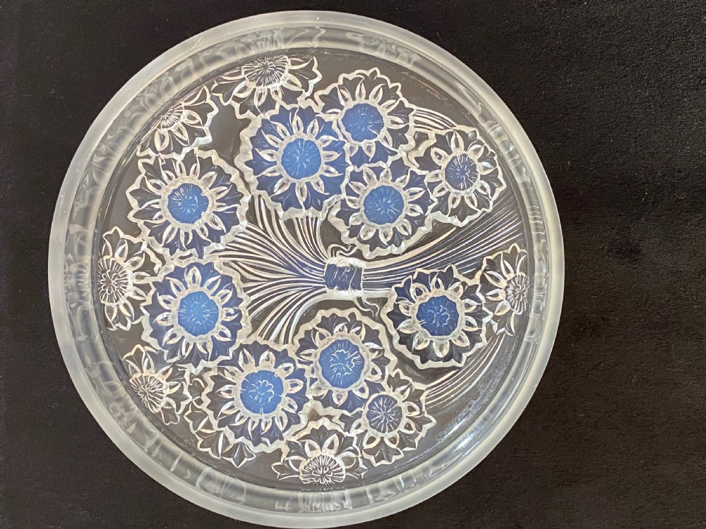 A circular French Art Deco opalescent glass box and cover with a raised moulded floral motif. View VII