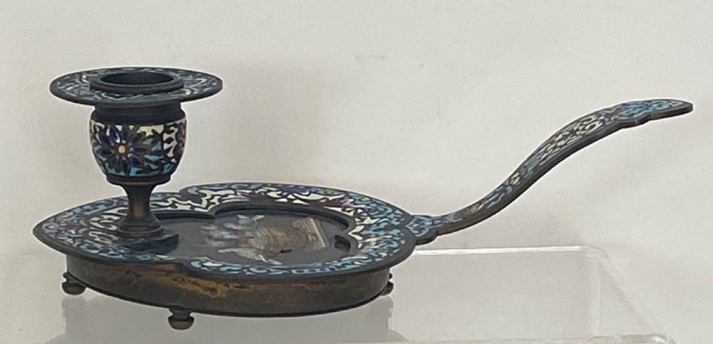 An antique metal chamberstick decorated with turquoise cloisonne enamel scrollwork surrounding a central micromosaic panel of birds drinking from a bowl. View IV