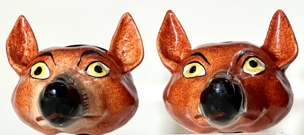 Pair of Staffordshire Fox Stirrup Cups.