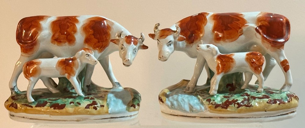 Pair of 19th Century Staffordshire Cows with their Calves