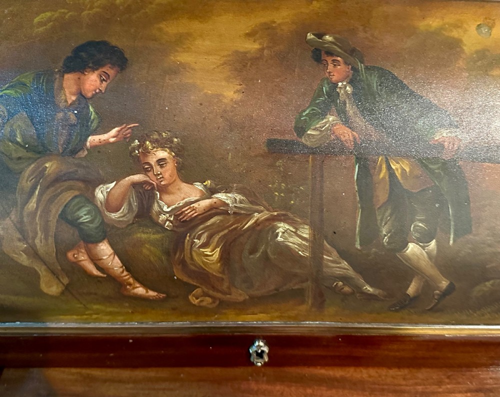 A mahogany French cylinder escritoire featuring a central painted pastoral scene on the roll-top, upper drawer tier, brass mounts, and slender fluted legs. View VIII
