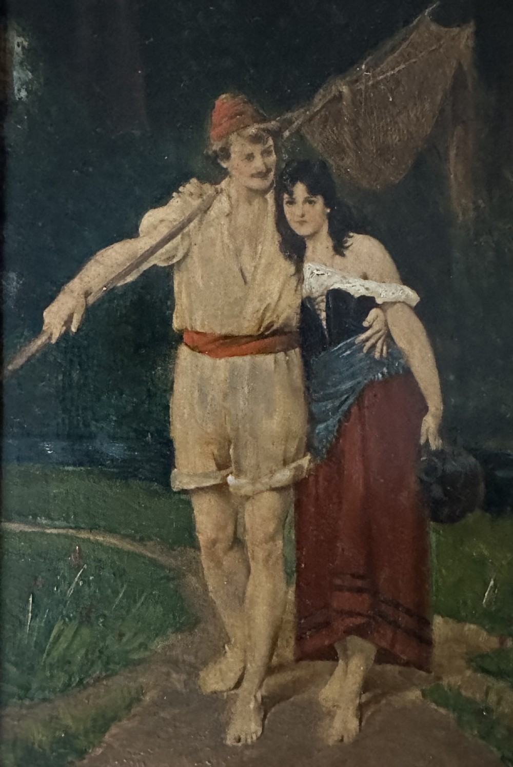 A pair of vertical oil paintings on wooden panels depicting rural couples, framed in dark oak moulding with gilt inner slips. View III