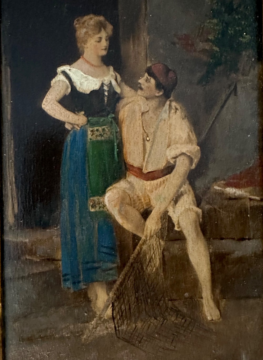 A pair of vertical oil paintings on wooden panels depicting rural couples, framed in dark oak moulding with gilt inner slips. View VI