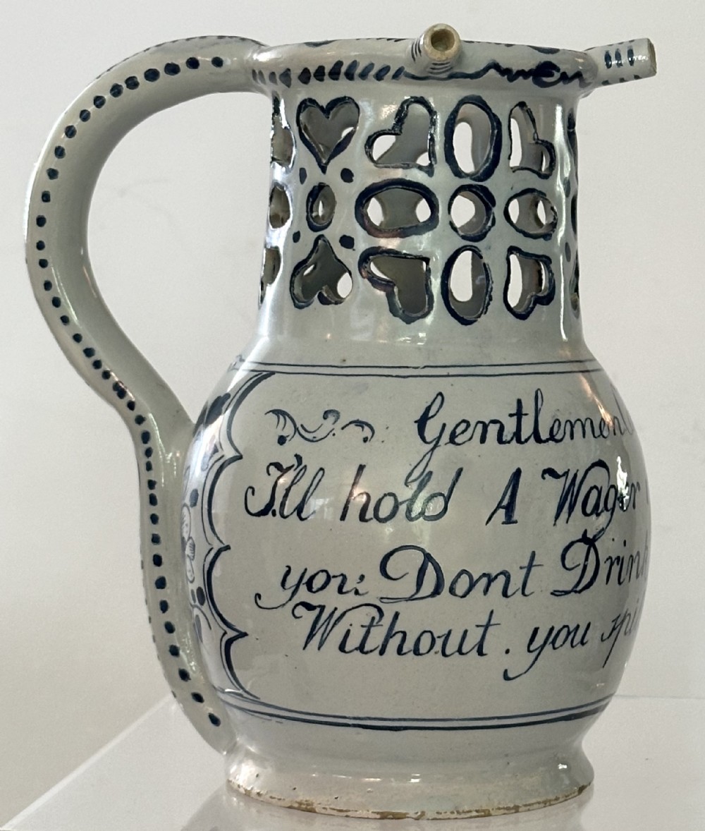  18th Century English Delftware Puzzle Jug.