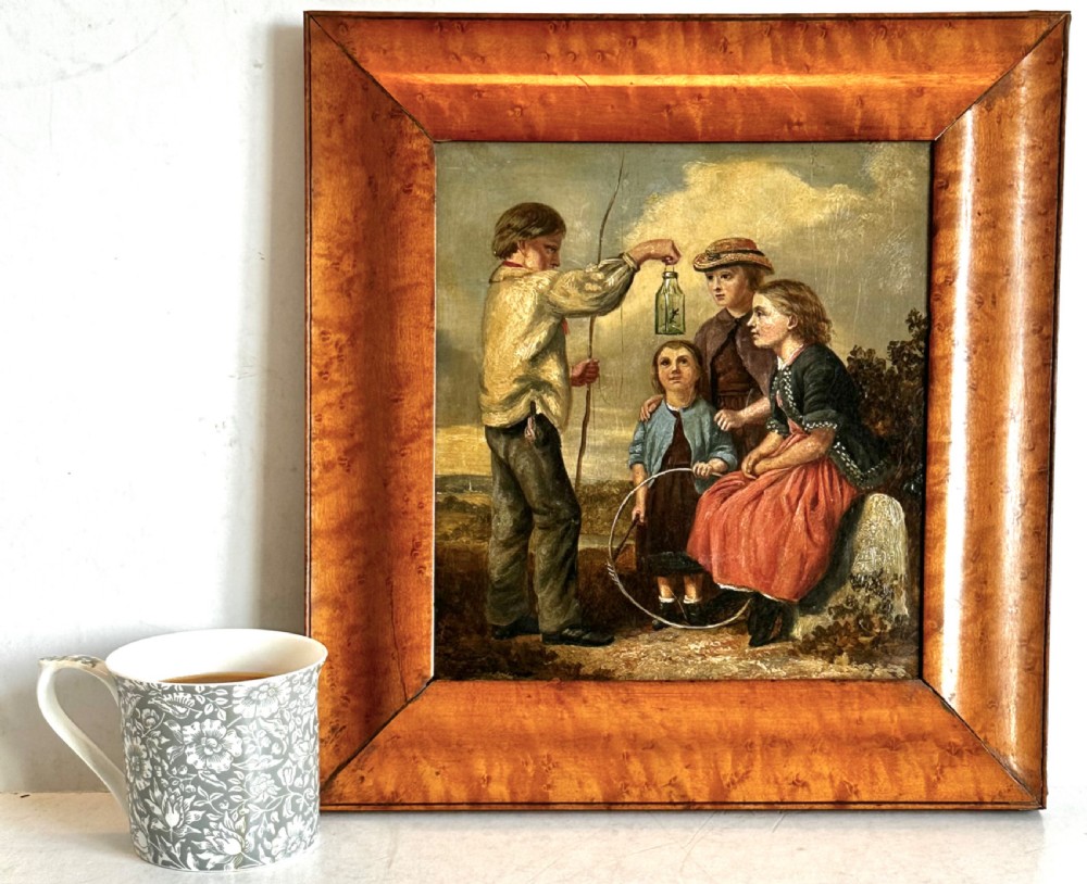 A 19th-century Victorian oil painting on panel depicting four children outdoors, framed in a wide burr maple timber frame. View VIII