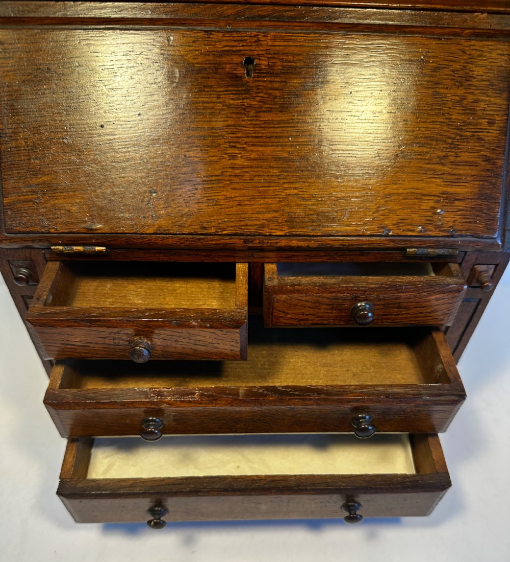 Apprentice  Dresser with Miniature Shakespeare Books. View XI