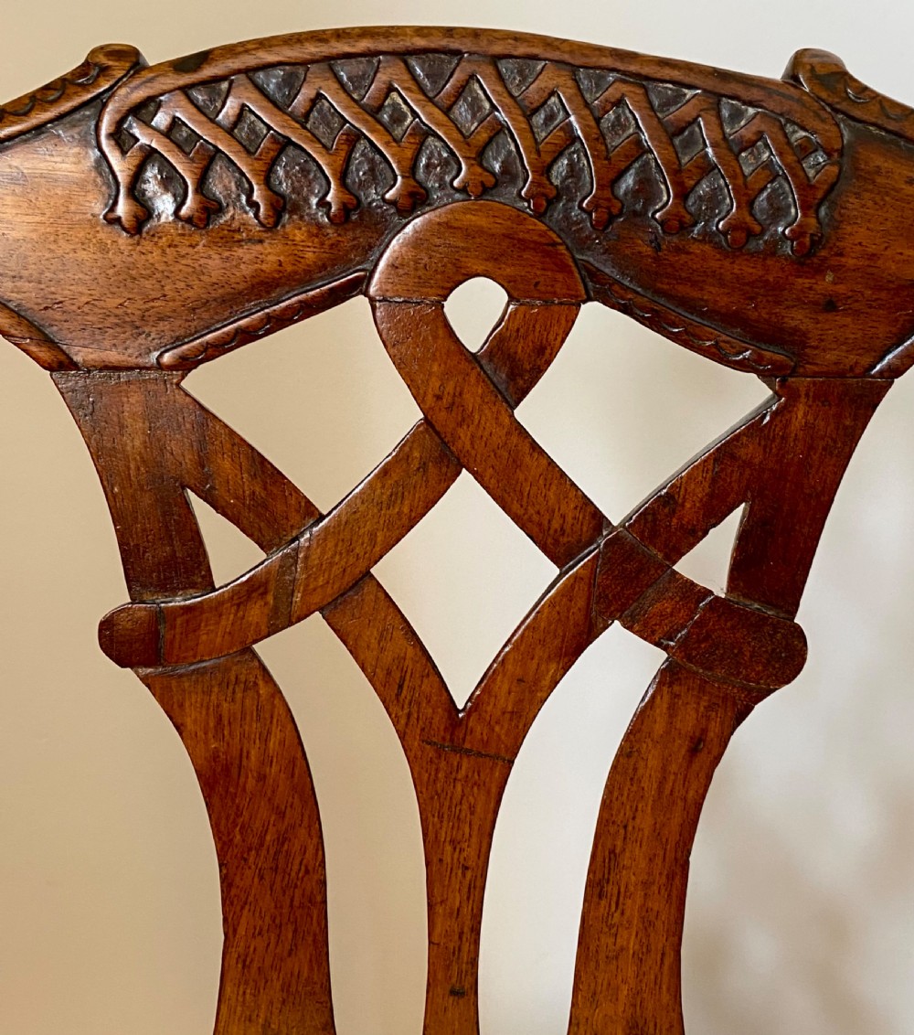 A dark walnut Georgian side chair featuring an intricately carved ribbon-back splat and a gold and red striped upholstered seat. View XI