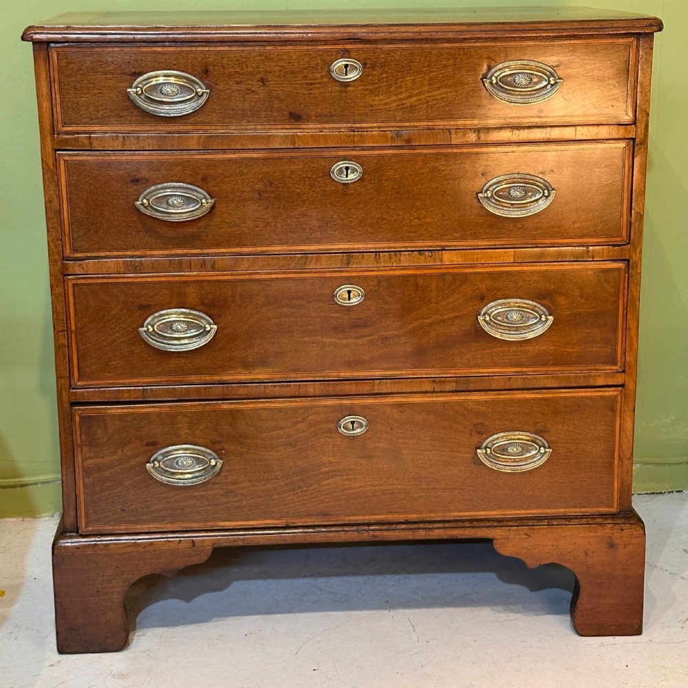 George III Walnut Chest of Drawers. View II