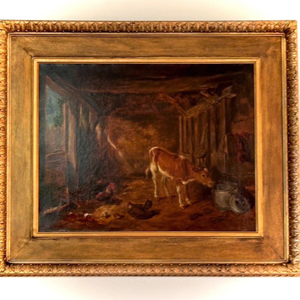 An oil painting on canvas depicting a young calf standing beside a milk container inside a timber barn with chickens on the floor, framed in a wide gilded wood frame. View IX