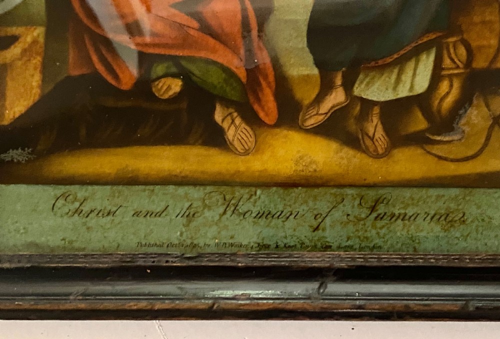 A pair of framed Georgian reverse glass paintings depicting biblical scenes inside dark ebonised wooden frames. View VII