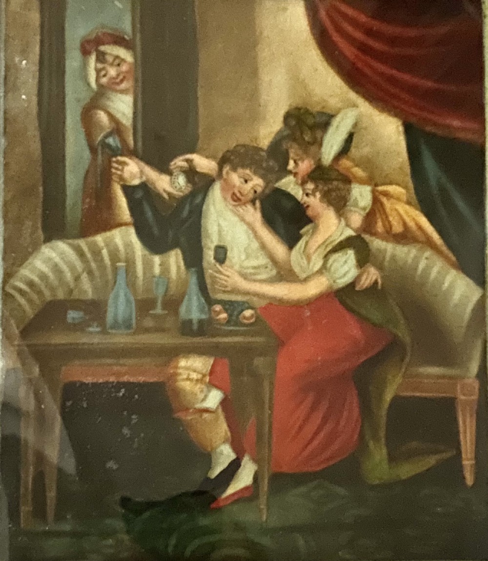 A pair of framed Georgian reverse glass paintings depicting biblical scenes inside dark ebonised wooden frames. View X