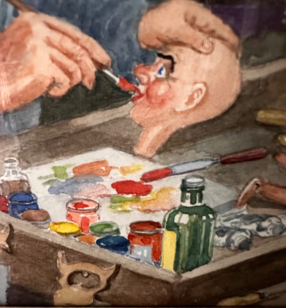 A framed watercolour painting depicting a craftsman at a workbench painting a marionette head, surrounded by finished puppets hanging in the background. View V