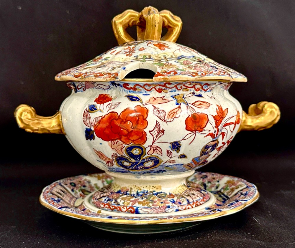 An antique Victorian Masons ironstone sauce tureen with matching stand, decorated in Imari floral enamel patterns with gilded scroll handles. View III