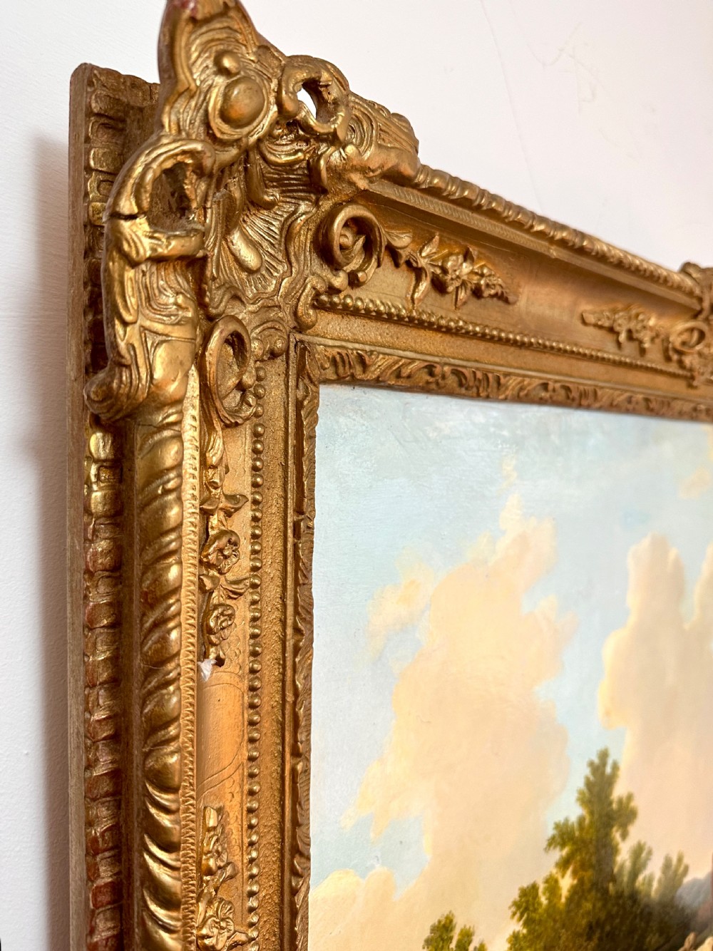 An oil painting on canvas depicting livestock resting in a pastoral field, housed within an ornate gold gilt frame. View III