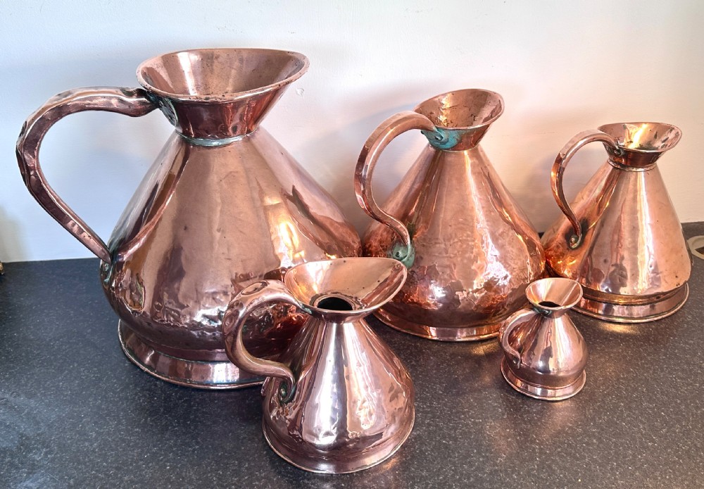Copper Measuring Jugs of Large Proportion View IV