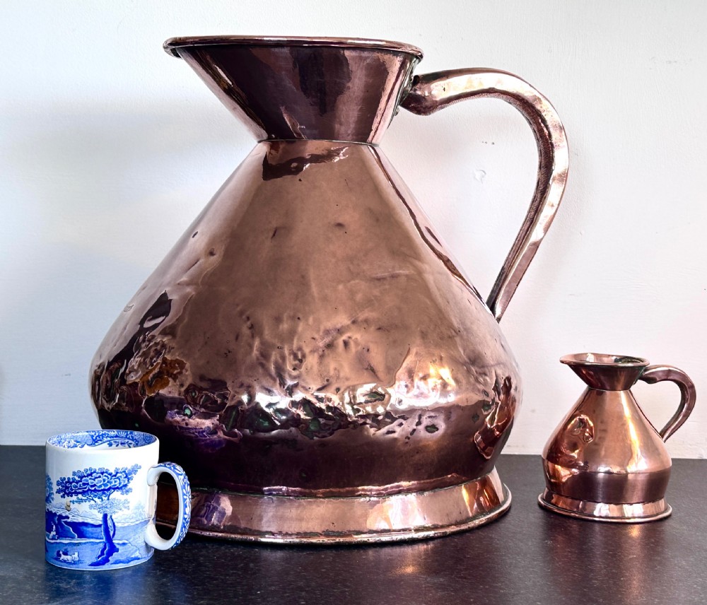Copper Measuring Jugs of Large Proportion View IX
