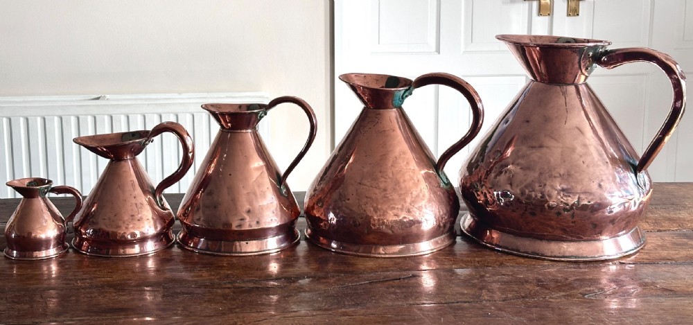 Copper Measuring Jugs of Large Proportion View XIII