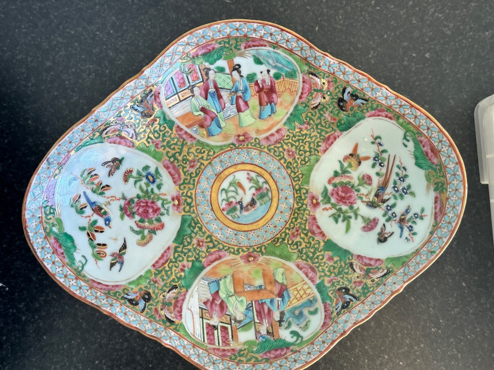 A 19th-century Chinese Canton export porcelain pedestal dish featuring hand-painted famille rose enamels with central figure scenes and floral motifs. View V
